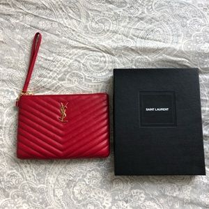 Saint Laurent Monogrammed leather pouch-used once